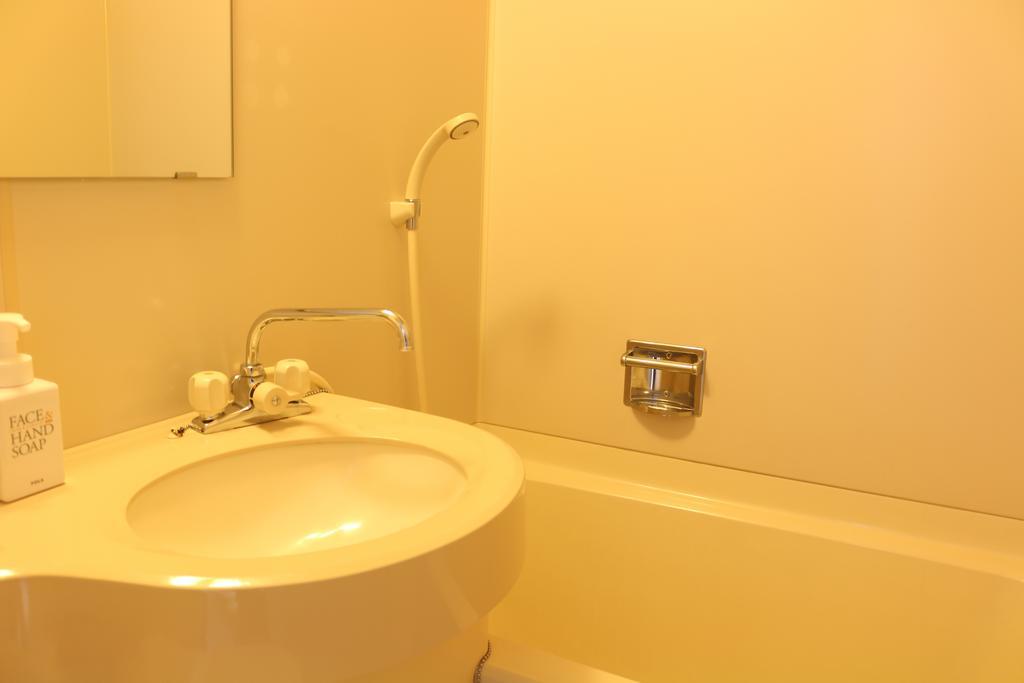 Hotel Sankeien Sapporo Rom bilde