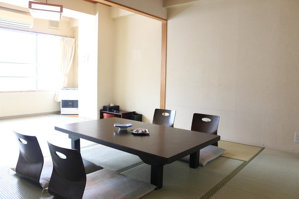 Hotel Sankeien Sapporo Rom bilde