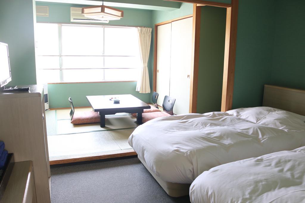 Hotel Sankeien Sapporo Rom bilde