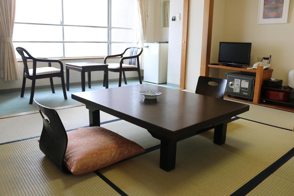 Hotel Sankeien Sapporo Rom bilde